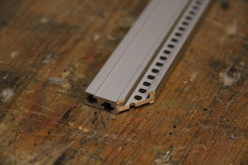 Outer, bottom rail with sawed off edge